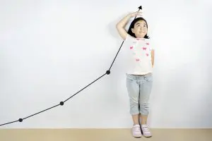 Anak mengukur Tinggi