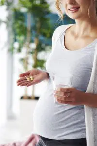women pregnant eat medicine
