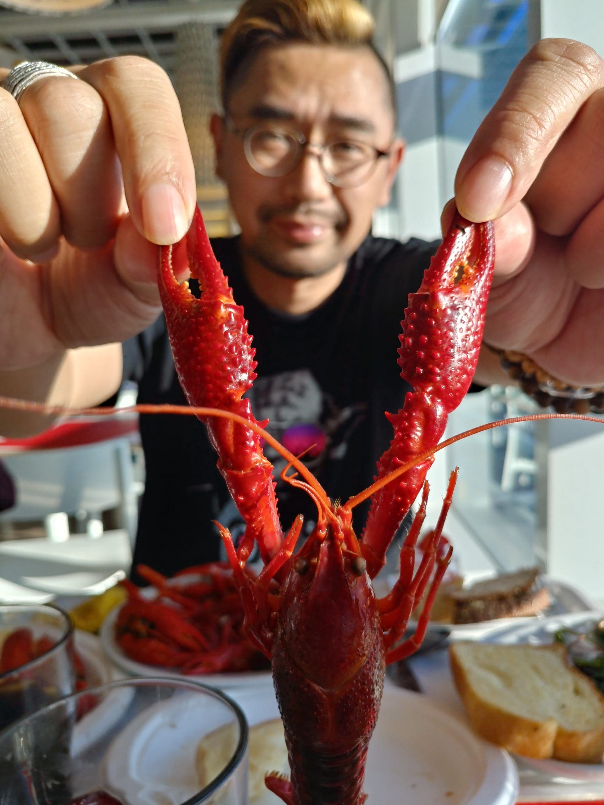 Prawn eating by man